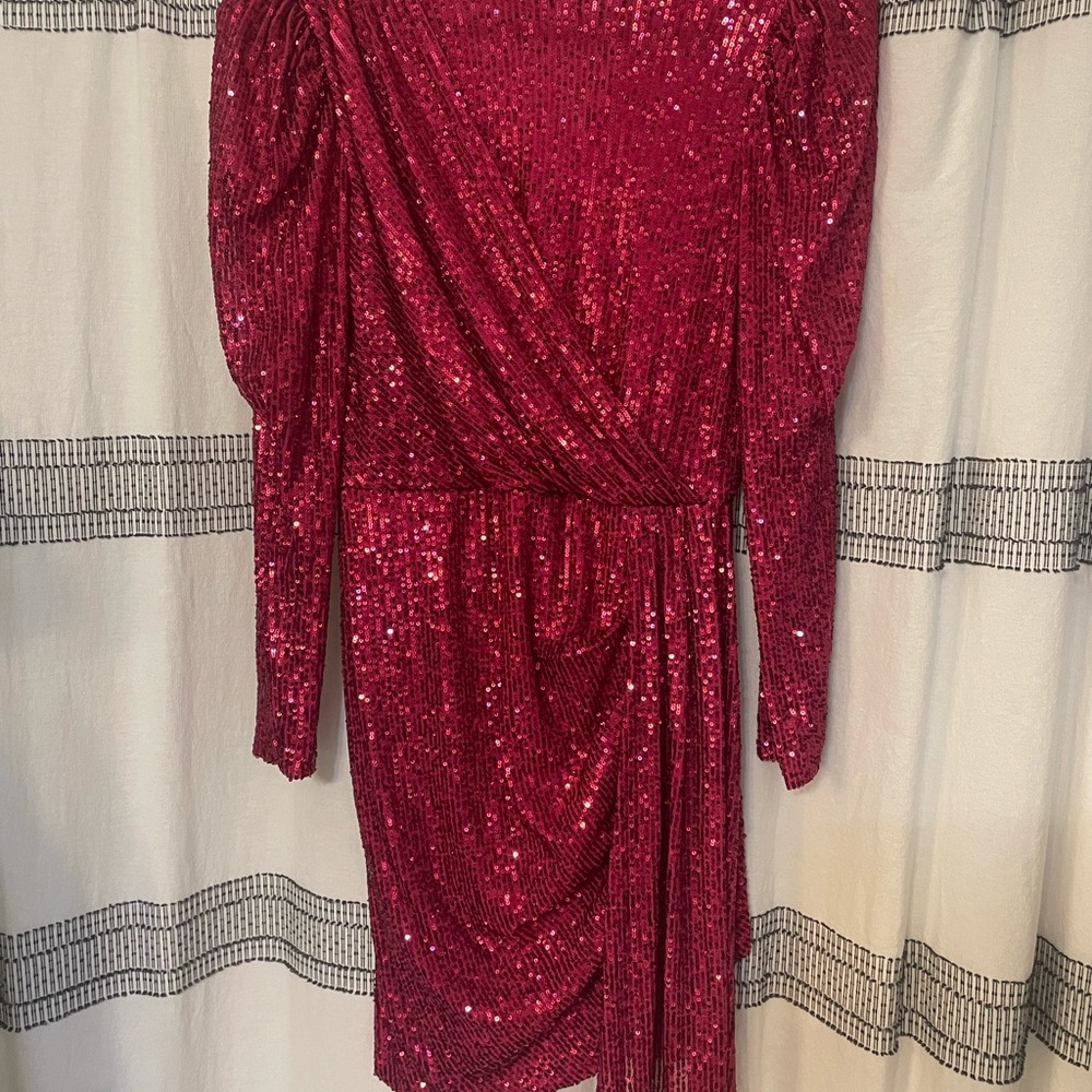 Beautiful mini dress. Worn once. Was dry cleaned. Fits as 10-12.